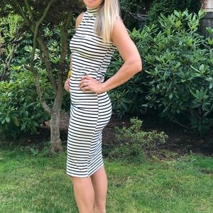 Used. Fitted midi striped cotton dress